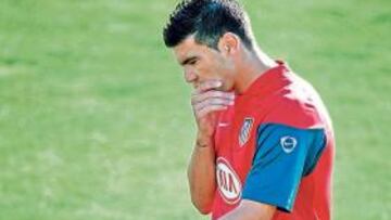 Reyes, con gesto serio.