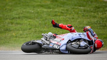 LAGOA, ALGARVE, PORTUGAL - MARCH 24: Francesco Bagnaia of Ducati Team and Italy and Marc Marquez of Gresini Racing and Spain crash during the Race of the MotoGP Of Portugal at Autodromo do Algarve on March 24, 2024 in Lagoa, Algarve, Portugal. (Photo by Diogo Cardoso/DeFodi Images via Getty Images)