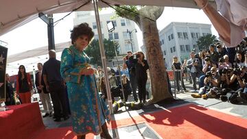 FILE PHOTO: Italian actor Gina Lollobrigida poses on her star after it was unveiled on the Hollywood Walk of Fame in Los Angeles, California, U.S., February 1, 2018. REUTERS/Mario Anzuoni/File Photo