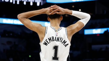 SAN ANTONIO, TX - MARCH 22: Victor Wembanyama #1 of the San Antonio Spurs reacts after being called for a charge on the Memphis Grizzlies in the first half at Frost Bank Center on March 22, 2024 in San Antonio, Texas. NOTE TO USER: User expressly acknowledges and agrees that, by downloading and or using this photograph, User is consenting to terms and conditions of the Getty Images License Agreement.   Ronald Cortes/Getty Images/AFP (Photo by Ronald Cortes / GETTY IMAGES NORTH AMERICA / Getty Images via AFP)