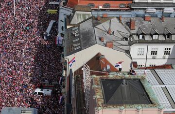 Soccer Football - World Cup - The Croatia team return from the World Cup in Russia - Zagreb, Croatia - July 16, 2018   General view as Croatia fans stand on a rooftop near the main square in Zagreb while they await the arrival of the team    REUTERS/Marko