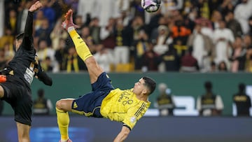 Nassr's Portuguese forward #07 Cristiano Ronaldo (R) kicks the ball to score his team's fourth goal during the Saudi Pro League football match between Al-Nassr and Al-Khaleej at Al-Awwal Park in Riyadh on November 23, 2025. (Photo by Fayez NURELDINE / AFP)