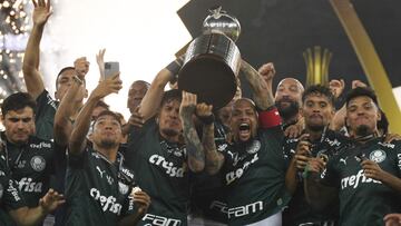 Soccer Football - Copa Libertadores - Final - Palmeiras v Santos - Estadio Maracana, Rio de Janeiro, Brazil - January 30, 2021 Palmeiras players celebrate winning the Copa Libertadores with the trophy Pool via REUTERS/Mauro Pimentel