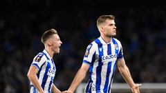 Real Sociedad's Norwegian forward Alexander Sorloth (R) celebrates with Real Sociedad's Spanish midfielder Benat Turrientes after scoring his team's first goal during the UEFA Europa League, first round, group E, football match between Real Sociedad and FC Sheriff at the Anoeta stadium in San Sebastian on October 13, 2022. (Photo by ANDER GILLENEA / AFP) (Photo by ANDER GILLENEA/AFP via Getty Images)