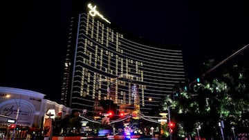 (FILES) In this file photo taken on April 27, 2020, the Wynn Las Vegas shows guest rooms illuminated to spell out &quot;Hope Shines Bright&quot; as the resort remains closed, in Las Vegas, Nevada. - Another 3.84 million US workers filed for unemployment b