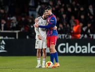 ALBACETE, SPAIN - FEBRUARY 03: Agustin Medina of Albacete Balompie embraces with Gerard Martin of FC Barcelona following the Copa Del Rey Quarter Final match between Albacete Balompie and FC Barcelona at Estadio Carlos Belmonte on February 03, 2026 in Albacete, Spain. (Photo by Angel Martinez/Getty Images)