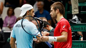 Tennis - Davis Cup - Group A - Croatia v Argentina - Unipol Arena, Bologna, Italy - September 17, 2022 Croatia's Borna Coric and Argentina's Francisco Cerundolo shake hands after their match REUTERS/Ciro De Luca