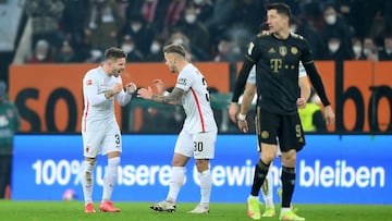 AUGSBURG, GERMANY - NOVEMBER 19: Mads Pedersen of FC Augsburg celebrates with Niklas Dorsch after scoring their team's first goal during the Bundesliga match between FC Augsburg and FC Bayern München at WWK-Arena on November 19, 2021 in Augsburg