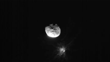 View of Didymos, Dimorphos, and the plume coming off of Dimorphos after the Double Asteroid Redirect Test, or DART mission, purposefully made impact, in this image acquired by ASI's LICIACube satellite just before its closest approach to the Dimorphos asteroid, September 26, 2022. ASI/NASA/Handout via REUTERS   ATTENTION EDITORS -  THIS IMAGE HAS BEEN SUPPLIED BY A THIRD PARTY