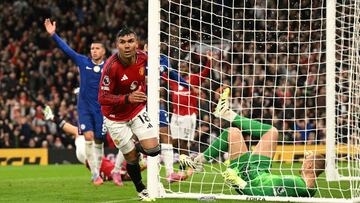 Manchester United's Brazilian midfielder #18 Casemiro celebrates scoring the team's second goal during the English Premier League football match between Manchester United and Chelsea at Old Trafford in Manchester, north west England, on September 20, 2025. (Photo by Oli SCARFF / AFP) / RESTRICTED TO EDITORIAL USE. No use with unauthorized audio, video, data, fixture lists, club/league logos or 'live' services. Online in-match use limited to 120 images. An additional 40 images may be used in extra time. No video emulation. Social media in-match use limited to 120 images. An additional 40 images may be used in extra time. No use in betting publications, games or single club/league/player publications. /