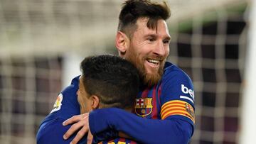 (FILES) In this file photo taken on January 30, 2019 Barcelona&#039;s Argentinian forward Lionel Messi celebrates with Barcelona&#039;s Uruguayan forward Luis Suarez after scoring during the Spanish Copa del Rey (King&#039;s Cup) quarter-final second leg 