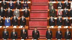 Chinese President Xi Jinping (front row, C) and others sing the national anthem during the opening ceremony of the National People's Congress at the Great Hall of the People in Beijing on March 5, 2023. (Photo by Kyodo News via Getty Images)