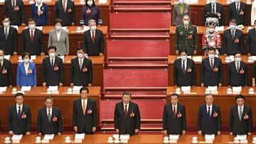 Chinese President Xi Jinping (front row, C) and others sing the national anthem during the opening ceremony of the National People's Congress at the Great Hall of the People in Beijing on March 5, 2023. (Photo by Kyodo News via Getty Images)