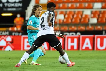 Luka Modric y Thierry Correia.