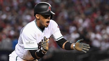 PHOENIX, AZ - OCTOBER 04: Ketel Marte #4 of the Arizona Diamondbacks reacts after hitting a RBI triple during the bottom of the second inning of the National League Wild Card game at Chase Field on October 4, 2017 in Phoenix, Arizona. Norm Hall/Getty Images/AFP
== FOR NEWSPAPERS, INTERNET, TELCOS & TELEVISION USE ONLY ==
