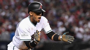 PHOENIX, AZ - OCTOBER 04: Ketel Marte #4 of the Arizona Diamondbacks reacts after hitting a RBI triple during the bottom of the second inning of the National League Wild Card game at Chase Field on October 4, 2017 in Phoenix, Arizona.   Norm Hall/Getty Images/AFP
 == FOR NEWSPAPERS, INTERNET, TELCOS &amp; TELEVISION USE ONLY ==