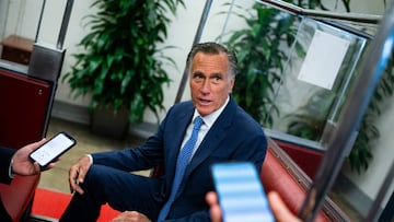 Senator Mitt Romney, a Republican from Utah, speaks to members of the media on the Senate subway following a vote in the basement of the US Capitol in Washington, D.C., US, on Tuesday, July 19, 2022. Senate Democrats are moving ahead with spending bills with little-to-no input from Republicans as members downplay any expectation of a bipartisan government funding deal in the near future. Photographer: Al Drago/Bloomberg via Getty Images