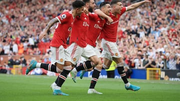 MANCHESTER, ENGLAND - APRIL 16: Cristiano Ronaldo of Manchester United (2R) celebrates with Jadon Sancho of Manchester United (L), Bruno Fernandes of Manchester United (2L) and Diogo Dalot of Manchester United (R)