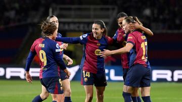 Barcelona's Spanish midfielder #14 Aitana Bonmati celebrates with teammates scoring her team's second goal during the UEFA Women's Champions League preliminary round group D football match between FC Barcelona and Manchester City FC at the Estadi Olimpic Lluis Companys in Barcelona on December 18, 2024. (Photo by Josep LAGO / AFP)