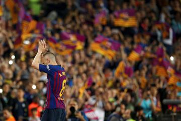 Andres Iniesta walks off the pitch. Iniesta, who joined Barcelona's academy 22 years ago, played his final game for the club.