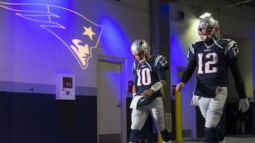 Jan 14, 2017; Foxborough, MA, USA; New England Patriots quarterback Jimmy Garoppolo (10) and quarterback Tom Brady (12) walk to the field before the AFC Divisional playoff game against the Houston Texans at Gillette Stadium. Mandatory Credit: Greg M. Cooper-USA TODAY Sports