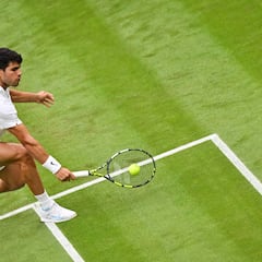 Why do they play on a grass surface at Wimbledon?