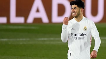 Real Madrid&#039;s Spanish midfielder Marco Asensio celebrates after scoring a goal during the Spanish League football match between Real Madrid and Celta Vigo at the Alfredo Di Stefano stadium in Valdebebas, northeast of Madrid, on January 2, 2021. (Phot