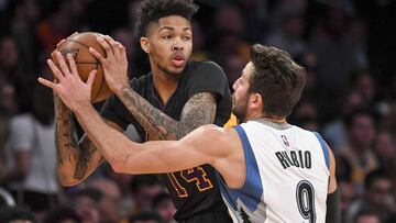 Mar 24, 2017; Los Angeles, CA, USA; Minnesota Timberwolves guard Ricky Rubio (9) defends Los Angeles Lakers forward Brandon Ingram (14) during the second half of a NBA basketball game at Staples Center. Mandatory Credit: Kirby Lee-USA TODAY Sports