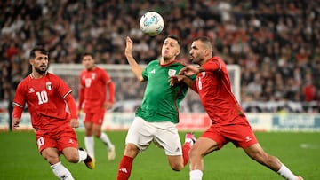 Basque Country's forward #17 Urko Iruretagoiene 'Izeta' (C) fights for the ball with Palestine's midfielder #06 Oday Kharoub (R) during the friendly football match between Basque Country and Palestine at San Mames Stadium in Bilbao on November 15, 2025. (Photo by ANDER GILLENEA / AFP)