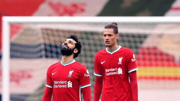 07 March 2021, United Kingdom, Liverpool: Liverpool's Mohamed Salah reacts in frsutration after his side conceded a goal during the English Premier League soccer match between Liverpool and Fulham at Anfield Stadium. Photo: Clive Brunskill/PA Wire/dp