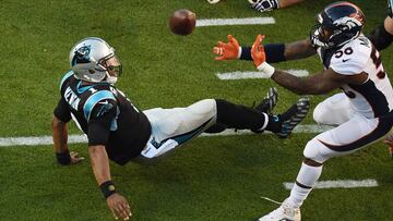 Feb 7, 2016; Santa Clara, CA, USA; Denver Broncos outside linebacker Von Miller (58) strips the ball from Carolina Panthers quarterback Cam Newton (1) in Super Bowl 50 at Levi's Stadium. Mandatory Credit: Ed Szczepanski-USA TODAY Sports