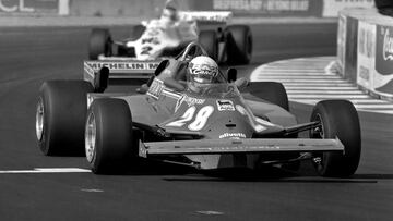 Didier Pironi drives the Ferrari F126CK 049B/Ferrari 021 ahead of Carlos Reutemann in the Williams FW07C 17/Ford Cosworth during the Caesar's Palace Grand Prix FIA Formula One World Championship race on the temporary circuit in Las Vegas, Nevada, on October 17, 1981.