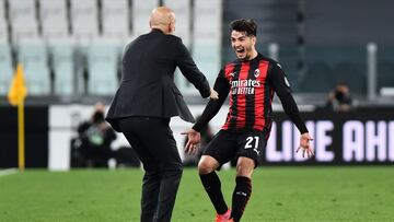 Soccer Football - Serie A - Juventus v AC Milan - Allianz Stadium, Turin, Italy - May 9, 2021 AC Milan's Brahim Diaz celebrates scoring their first goal with AC Milan coach Stefano Pioli REUTERS/Massimo Pinca