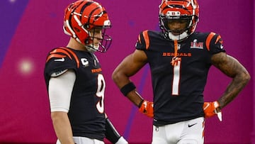 INGLEWOOD, CALIFORNIA - FEBRUARY 13: Joe Burrow #9 and Ja'Marr Chase #1 of the Cincinnati Bengals react on the field in the second quarter during Super Bowl LVI against the Los Angeles Rams at SoFi Stadium on February 13, 2022 in Inglewood, California.   Ronald Martinez/Getty Images/AFP
== FOR NEWSPAPERS, INTERNET, TELCOS & TELEVISION USE ONLY ==