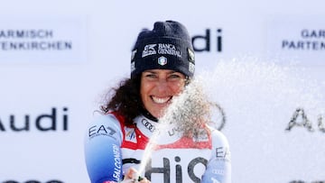 Alpine Skiing - FIS Alpine Ski World Cup - Women's Downhill - Garmisch-Partenkirchen, Germany - January 25, 2025 Italy's Federica Brignone celebrates on the podium after winning the Women's Downhill REUTERS/Gintare Karpaviciute TPX IMAGES OF THE DAY