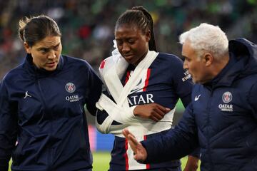 WOLFSBURG, GERMANY - MARCH 30: Kadidiatou Diani of Paris Saint-Germain receives medical treatment during the UEFA Women's Champions League quarter-final 2nd leg match between VfL Wolfsburg and Paris Saint-Germain at Volkswagen Arena on March 30, 2023 in Wolfsburg, Germany. (Photo by Maja Hitij/Getty Images)