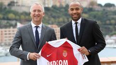 Monaco AS vice president Vadim Vasilyev (L) and Thierry Henry, new coach of the football club of Monaco, pose as part of a press conference in Monaco, on October 17, 2018. (Photo by Valery HACHE / AFP)