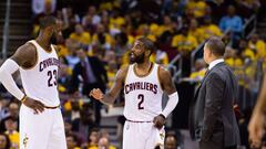 CLEVELAND, OH - MAY 1: LeBron James #23 Kyrie Irving and head coach Tyronn Lue of the Cleveland Cavaliers talk during the second half of Game One of the NBA Eastern Conference semifinals against the Toronto Raptors at Quicken Loans Arena on May 1, 2017 in Cleveland, Ohio. The Cavaliers defeated the Raptors 116-105. NOTE TO USER: User expressly acknowledges and agrees that, by downloading and or using this photograph, User is consenting to the terms and conditions of the Getty Images License Agreement.   Jason Miller/Getty Images/AFP
 == FOR NEWSPAPERS, INTERNET, TELCOS &amp; TELEVISION USE ONLY ==