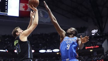 Feb 28, 2018; Dallas, TX, USA; Dallas Mavericks forward Dirk Nowitzki (41) scores his 31000th point over Oklahoma City Thunder forward Jerami Grant (9) during the first half at American Airlines Center. Mandatory Credit: Kevin Jairaj-USA TODAY Sports