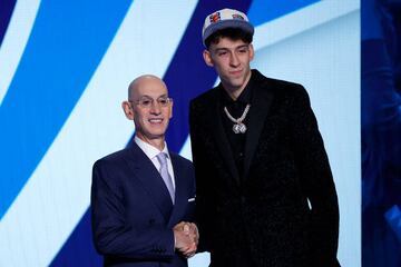 NBA commissioner Adam Silver (L) and Chet Holmgren who went 2nd overall pick to the Oklahoma City Thunder.