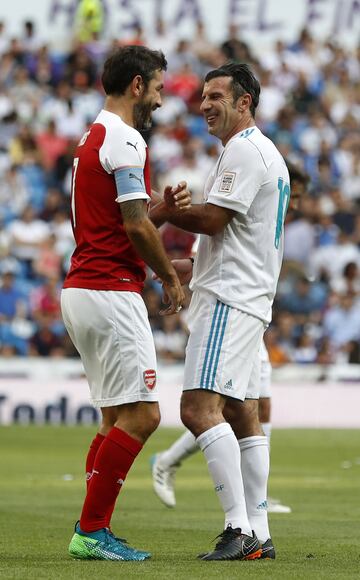 Robert Pires y Luis Figo.