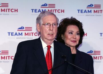 Republican US Senator Mitch McConnell of Kentucky (L) is joined by his wife Elaine Chao (R) as he speaks at a press conference following his projected senate race victory at the Omni Hotel in Louisville, Kentucky, USA, 03 November 2020.