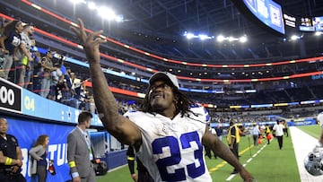 INGLEWOOD, CA - AUGUST 20: Rico Dowdle #23 of the Dallas Cowboys trows his gloves to fans after a pre season game against the Los Angeles Chargers at SoFi Stadium on August 20, 2022 in Inglewood, California.   Kevork Djansezian/Getty Images/AFP
== FOR NEWSPAPERS, INTERNET, TELCOS & TELEVISION USE ONLY ==