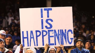 CHICAGO, IL - OCTOBER 22: Chicago Cubs fans hold a sign after the Chicago Cubs defeated the Los Angeles Dodgers 5-0 