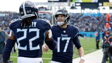 NASHVILLE, TENNESSEE - JANUARY 07: Derrick Henry #22 celebrates with Ryan Tannehill #17 of the Tennessee Titans after a touchdown during the second quarter against the Jacksonville Jaguars at Nissan Stadium on January 07, 2024 in Nashville, Tennessee.   Wesley Hitt/Getty Images/AFP (Photo by Wesley Hitt / GETTY IMAGES NORTH AMERICA / Getty Images via AFP)