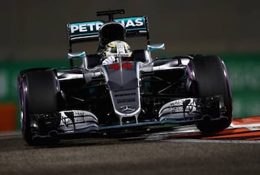 Hamilton takes Abu Dhabi pole ahead of title challenger Rosberg