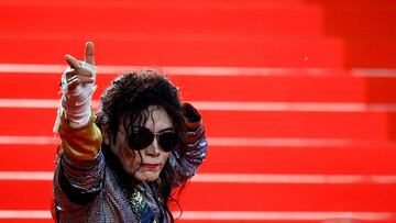 A person dressed as Michael Jackson poses on the red carpet during arrivals for the screening of the film "All We Imagine as Light" in competition at the 77th Cannes Film Festival in Cannes, France, May 23, 2024. REUTERS/Sarah Meyssonnier     TPX IMAGES OF THE DAY