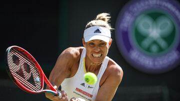 (FILES) In this file photograph taken on July 1, 2022, Germany's Angelique Kerber returns the ball to Belgium's Elise Mertens during their women's singles tennis match on the fifth day of the 2022 Wimbledon Championships at The All England Tennis Club in Wimbledon, southwest London. - Former women's world number one Angelique Kerber announced on August 24, 2022, that she is pregnant and has withdrawn from next week's US Open joking "two against one just isn't a fair competition." The 34-year-old German added that Flushing Meadow holds great memories for her. She won the title there in 2016 and, as a result, became world number one. (Photo by Adrian DENNIS / AFP) / RESTRICTED TO EDITORIAL USE