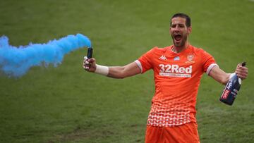 Soccer Football - Championship - Derby County v Leeds United - Pride Park, Derby, Britain - July 19, 2020 Leeds United's Kiko Casilla celebrates winning the Championship after the match, as play resumes behind closed doors following the outbreak of