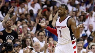 WASHINGTON, DC - APRIL 16: John Wall #2 of the Washington Wizards celebrates after hitting a three pointer in the second half of the Wizards 114-107 win over the Atlanta Hawks in Game One of the Eastern Conference Quarterfinals during the 2017 NBA Playoffs at Verizon Center on April 16, 2017 in Washington, DC. NOTE TO USER: User expressly acknowledges and agrees that, by downloading and or using this photograph, User is consenting to the terms and conditions of the Getty Images License Agreement.   Rob Carr/Getty Images/AFP
 == FOR NEWSPAPERS, INTERNET, TELCOS &amp; TELEVISION USE ONLY ==